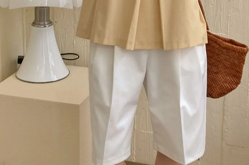 Sleeveless V-Neck Plain Flowy Blouse